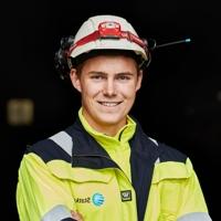 Young male professional smiling